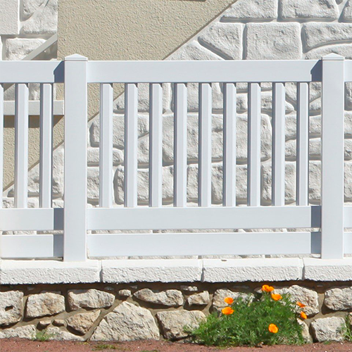 Clôture sur-mesure sur muret en pierre